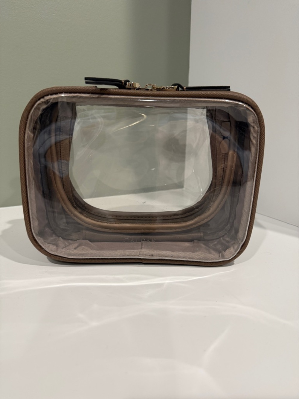 CALPAK small clear cosmetics case in Mocha
